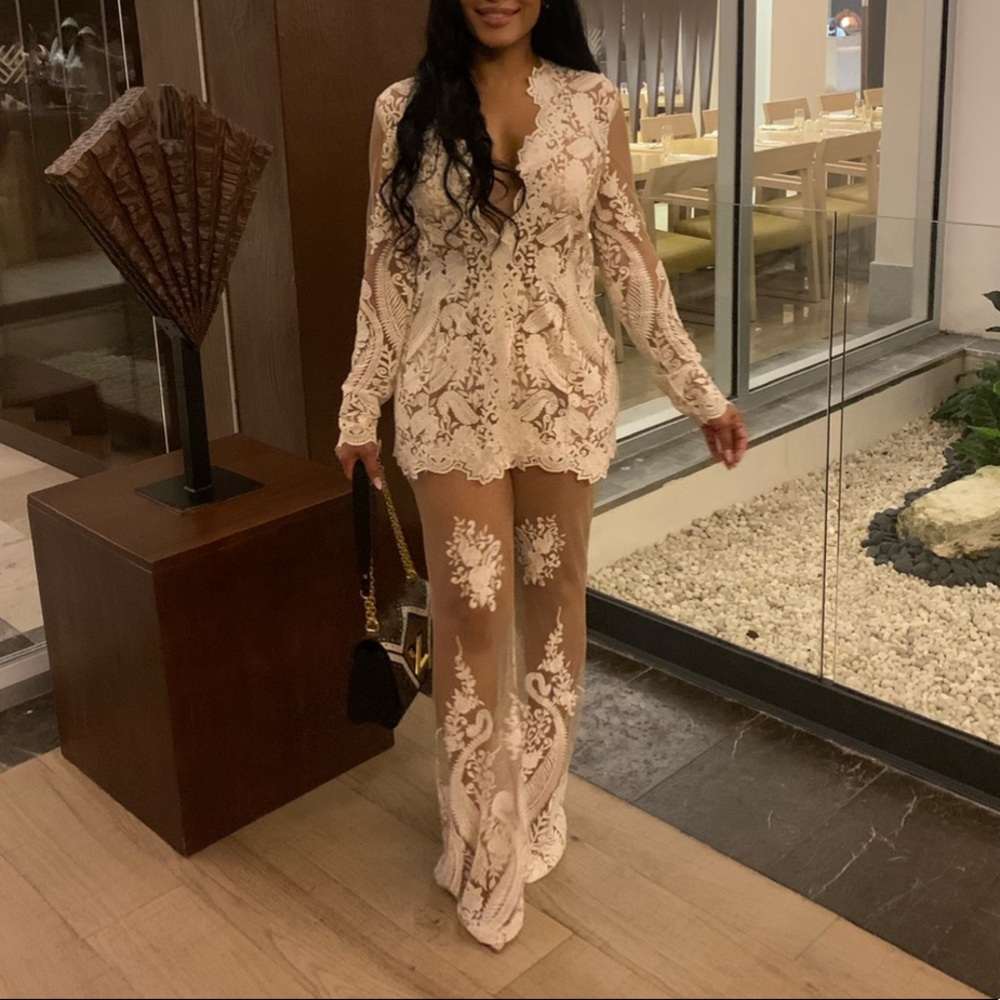 This 2 piece white & sheer suit will definitely turn heads. Worn for 2 hours.